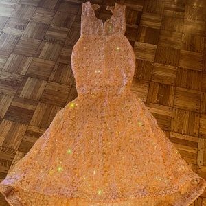 Custom made dress designed by Ghanaian celebrity designer Mimmy Yeboah.